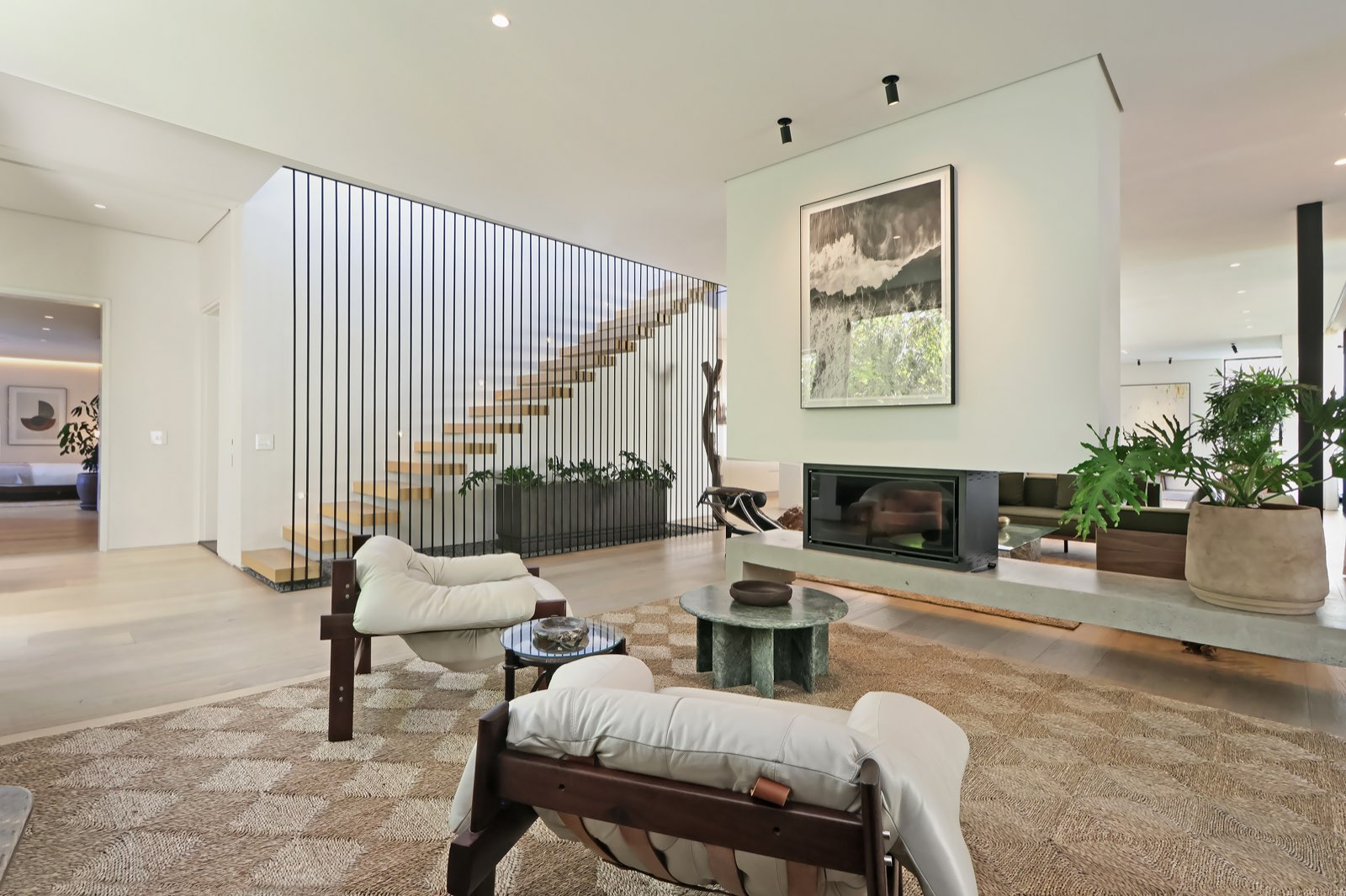 Lounge with Brazilian Mole chairs and fireplace